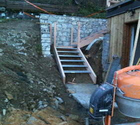 A new stairway to access the building at the chalet extension Courchevel build project