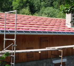 Building in Courchevel guttering added