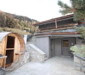 Ste Foy chalet renovation featuring a barrel sauna and extensive external landscaping