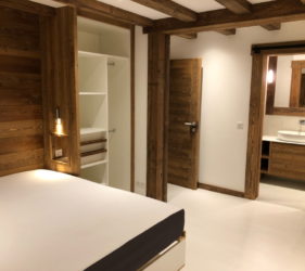 Ste Foy chalet construction interior design contrast wood and white walls